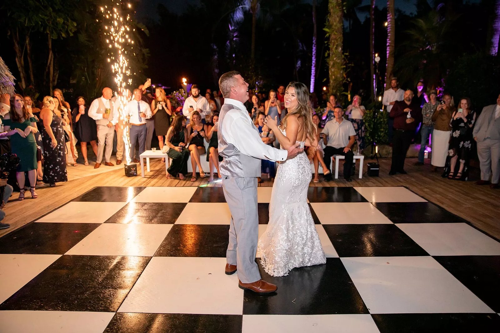 Checkered dance floor set up for an Oklahoma City wedding reception dance floor rental