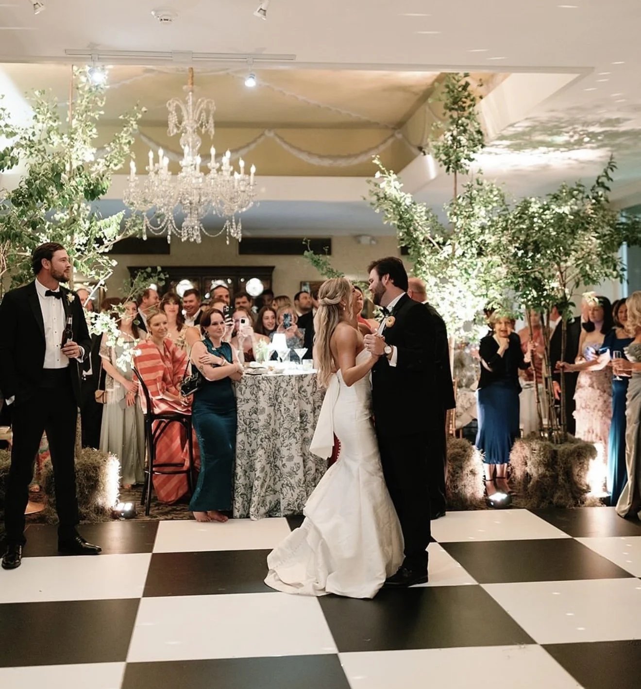 Guests gathered around a dance floor at an Oklahoma City wedding reception