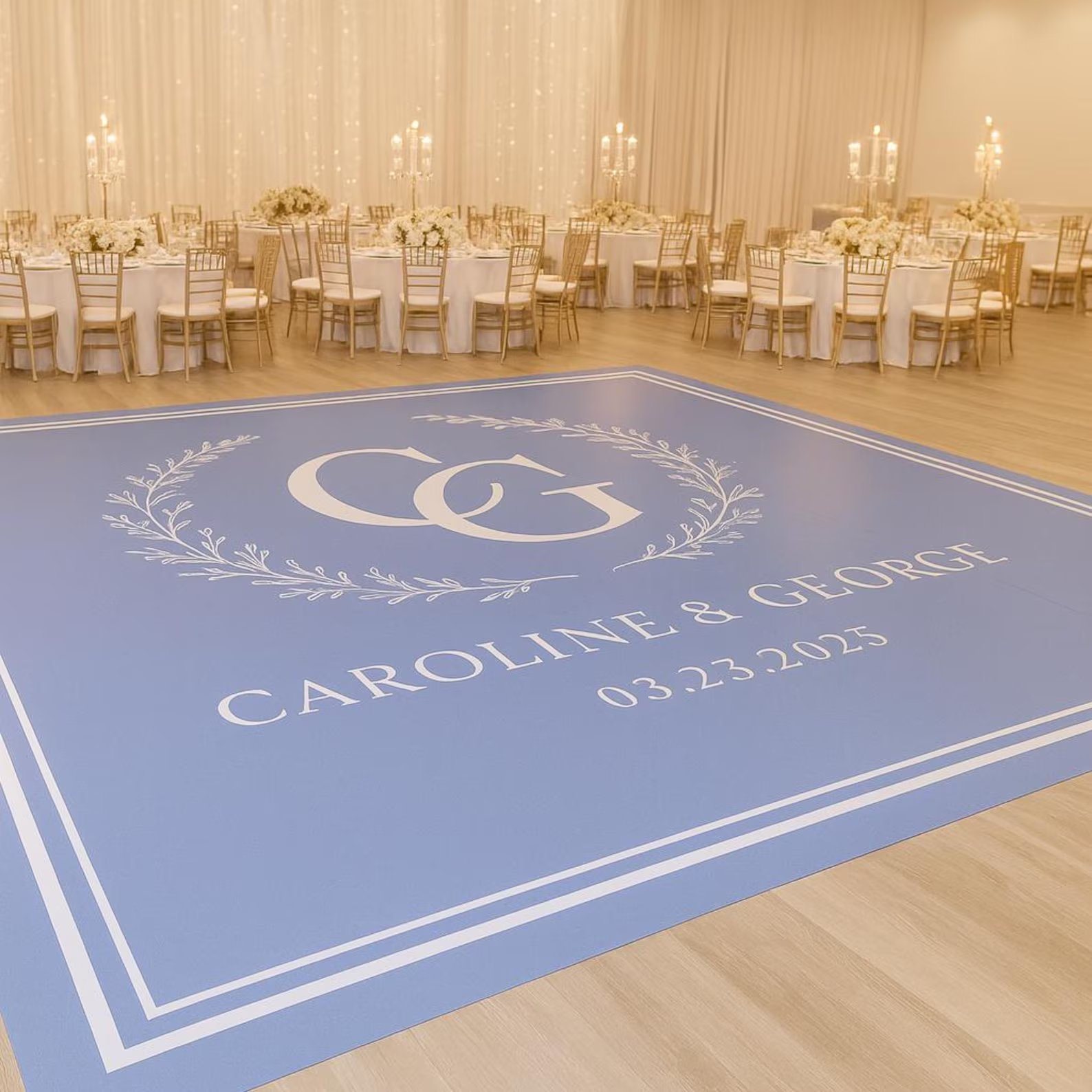 Custom printed dance floor wrap with a couple's monogram, names, and wedding date in an Oklahoma City ballroom