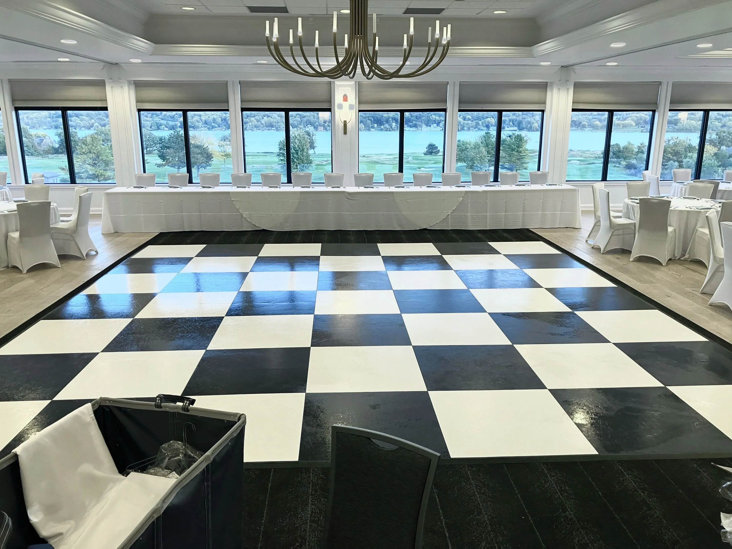 Black and white checkered dance floor at wedding